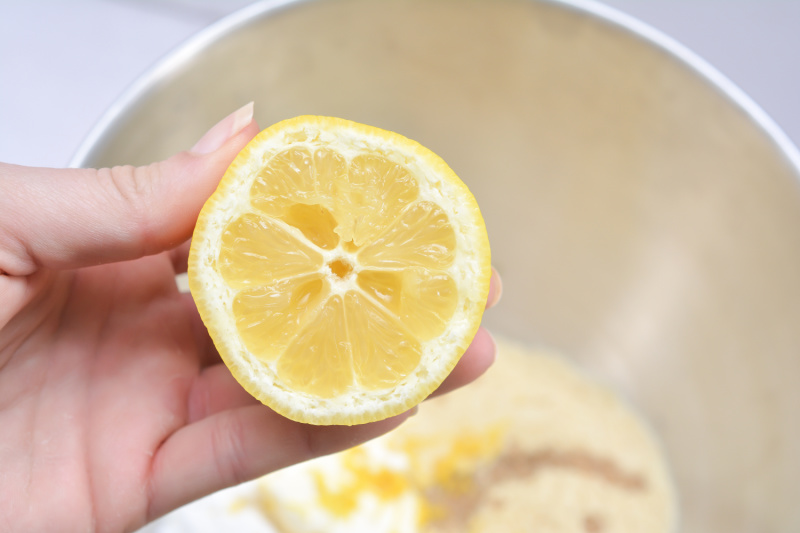 half a lemon near a mixing bowl