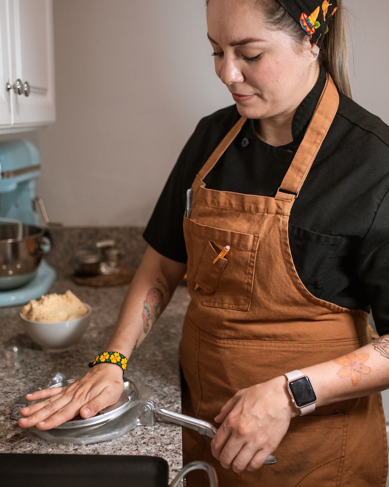 a woman making keto roti