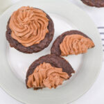 chocolate frosting on keto cupcakes