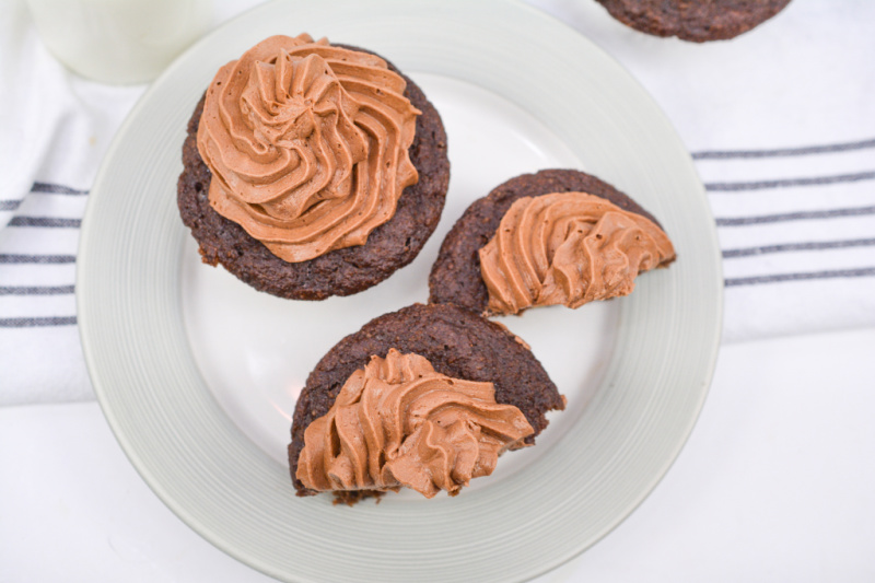 chocolate frosting on keto cupcakes