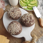 brown buns on a white cutting board