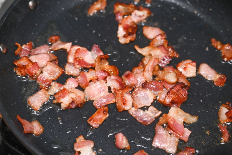 bacon cooking in a pan